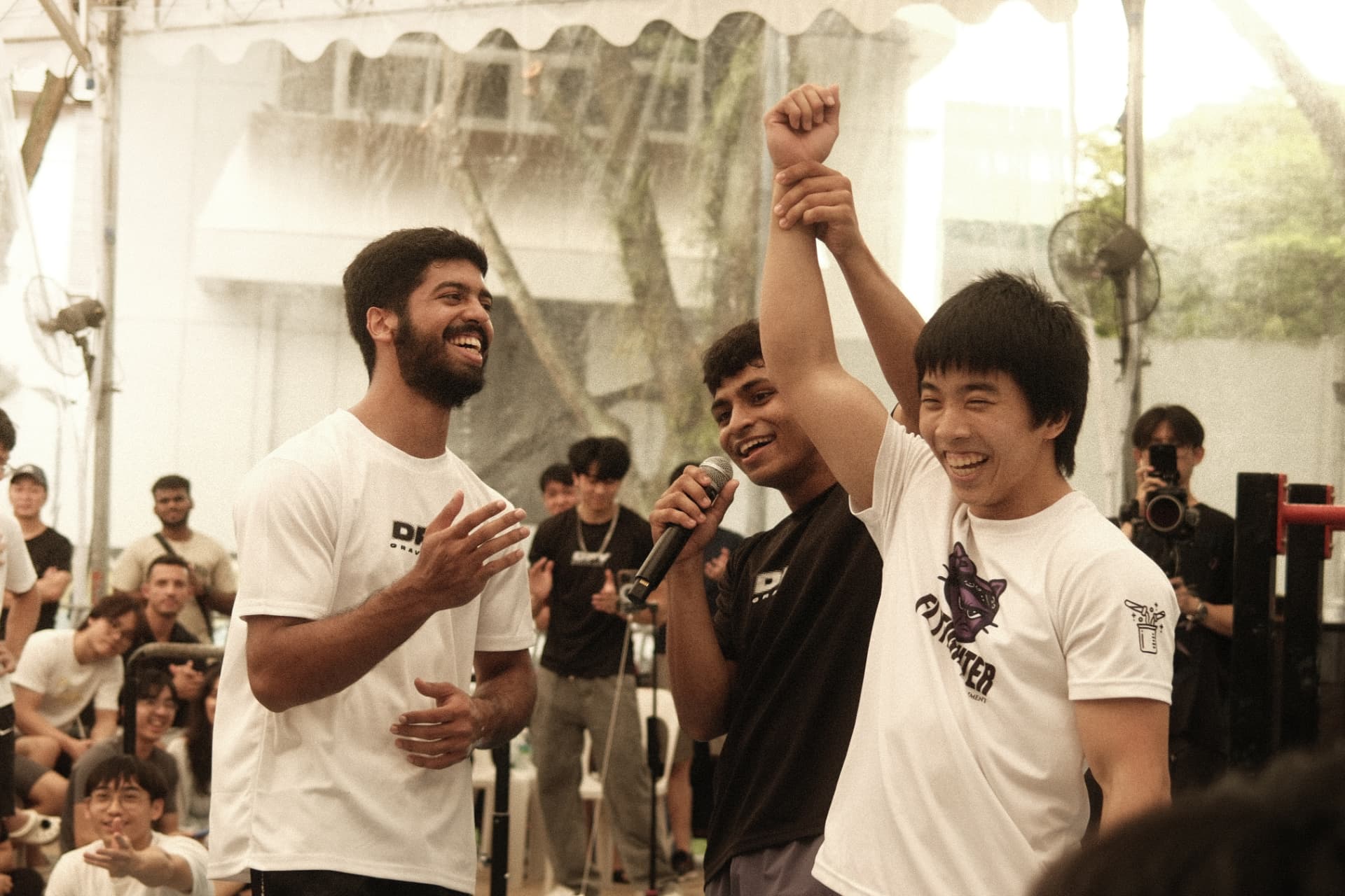 Competitors celebrating together at a Defy Gravity competition